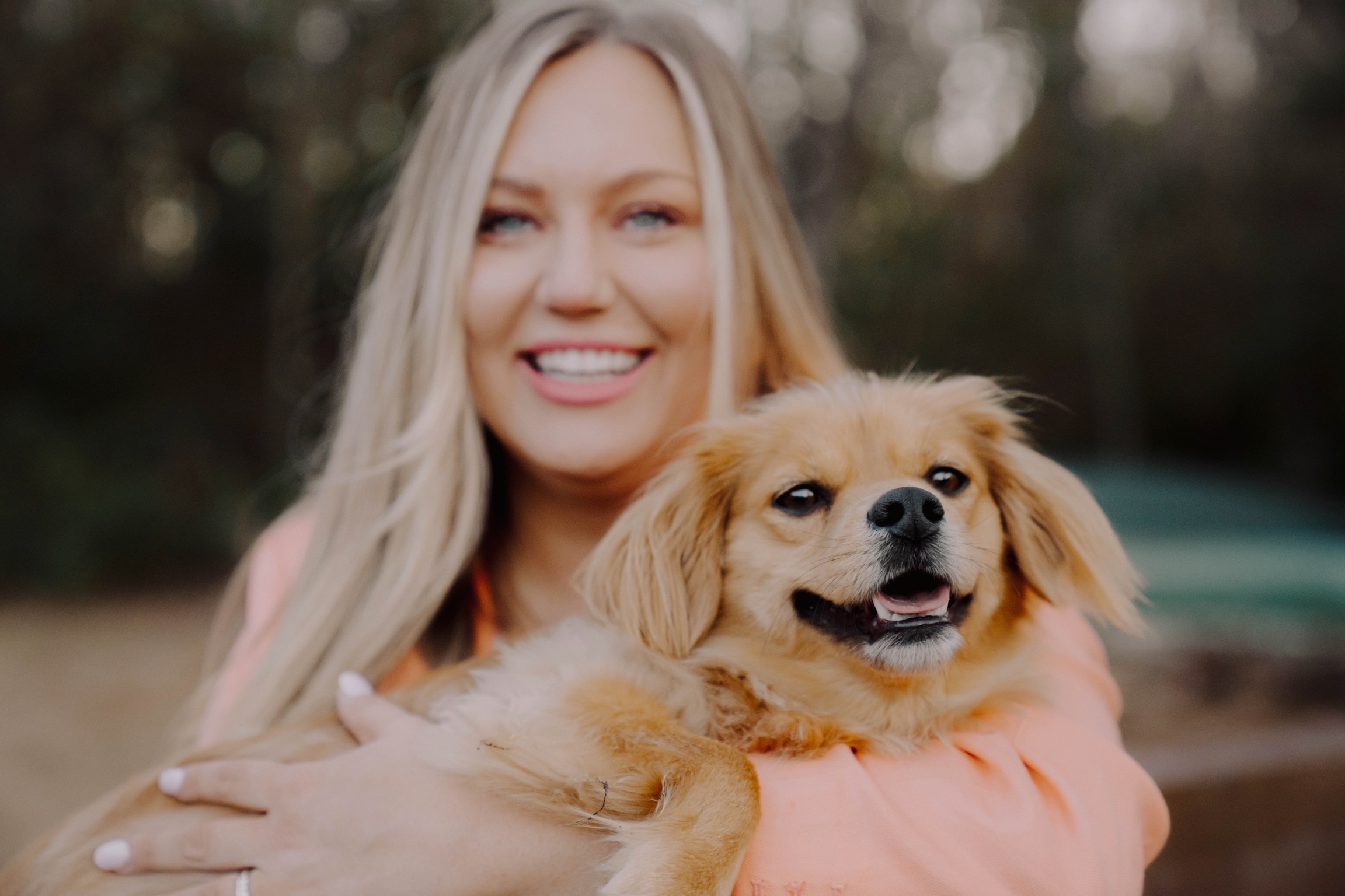 Jen holding a dog